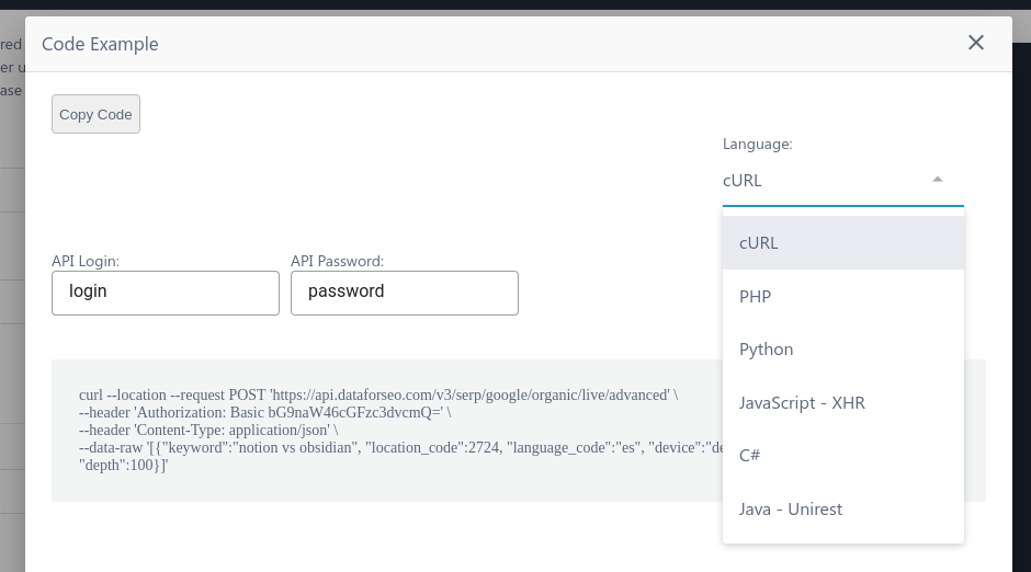 Captura de pantalla de código de ejemplo de la API de DataForSEO con un desplegable para cambiar el lenguaje de programación