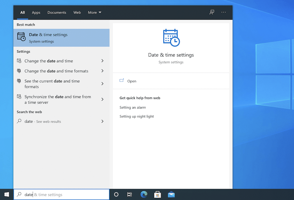 Searching for date and time settings using the Windows search bar.