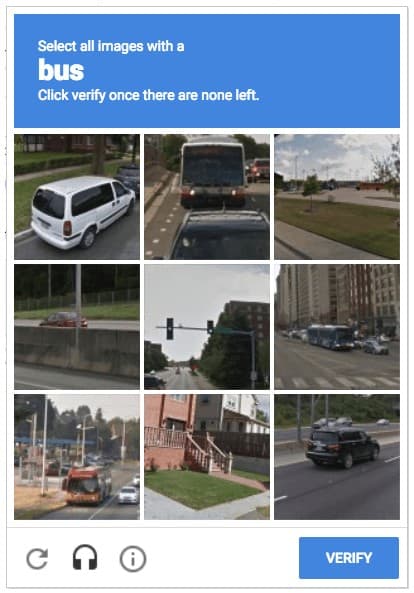 A CAPTCHA challenge asking you to"Select all images with a bus".