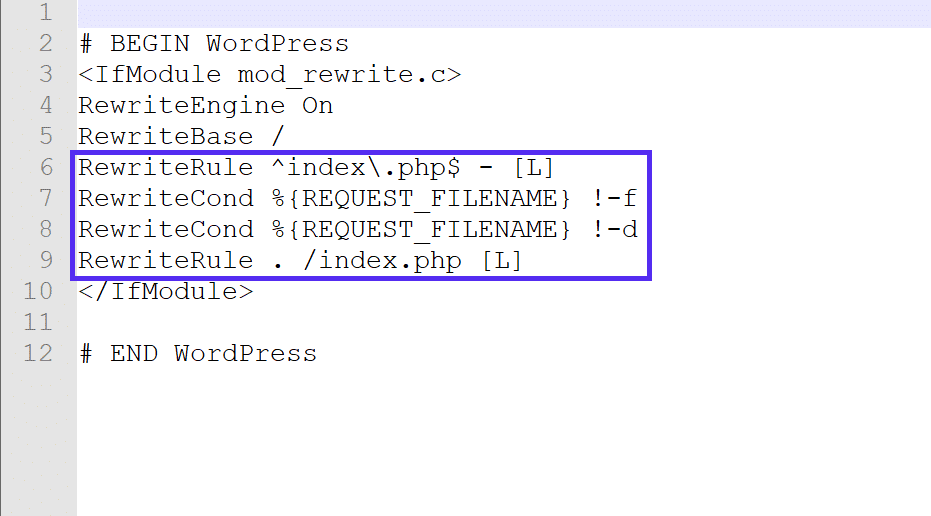 Schermata di un file .htaccess aperto nell'editor di testo, le direttive RewriteXXX all’interno del codice sono evidenziate.