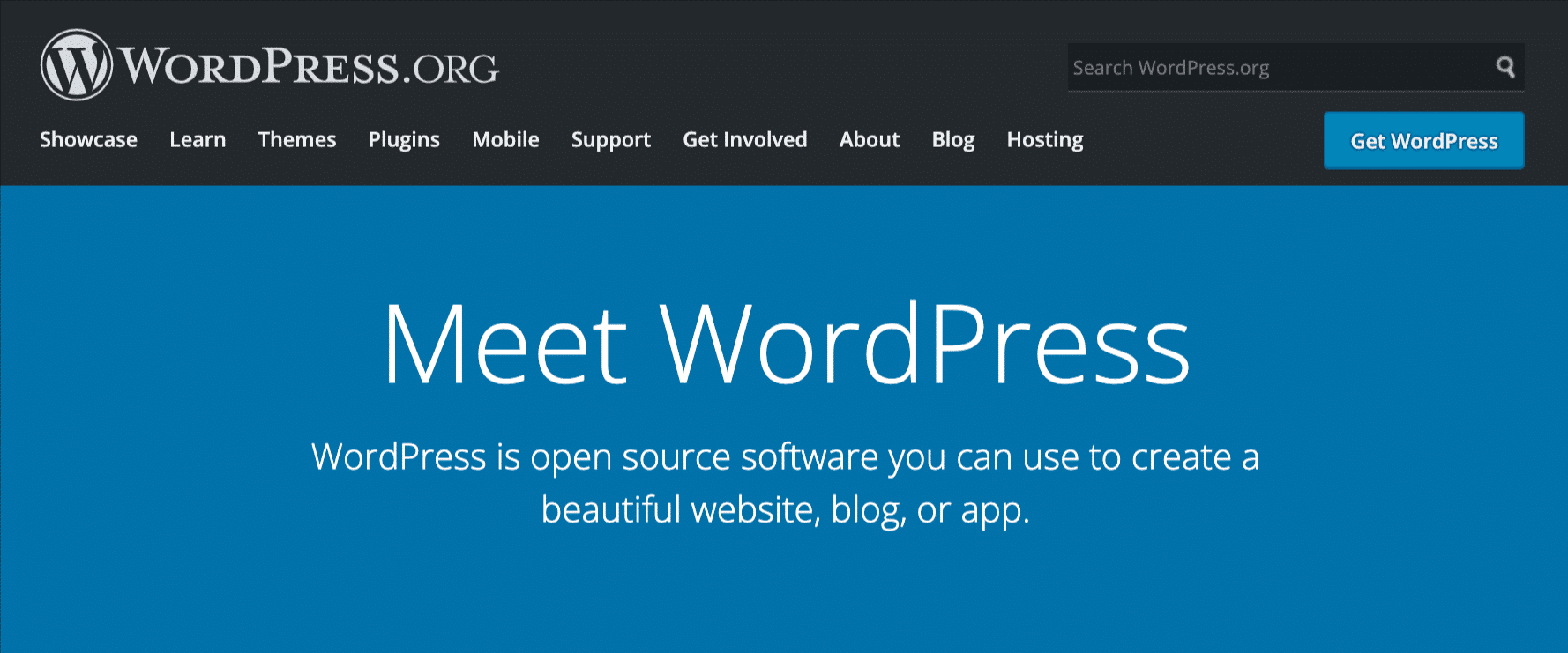Screenshot della homepage di WordPress.org con un testo bianco su uno sfondo blu che dice Meet WordPress 
