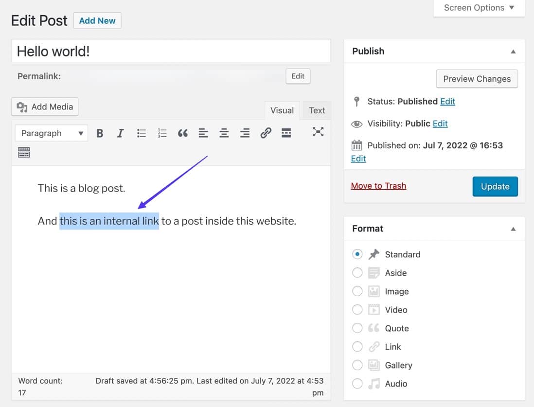 Schermata dell’editor classico di WordPress: una freccia indica una parte del testo nell’editor che dice "this is an internal link"