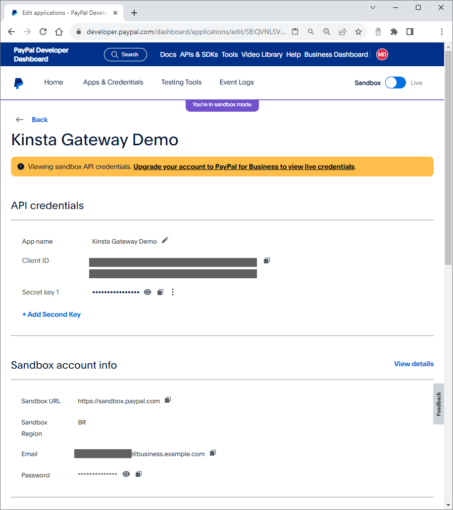 Credentials on PayPal for the Kinsta Gateway Demo app. The API credentials section has the app name, client ID, and secret key. The sandbox account info has the URL, region, email, and password