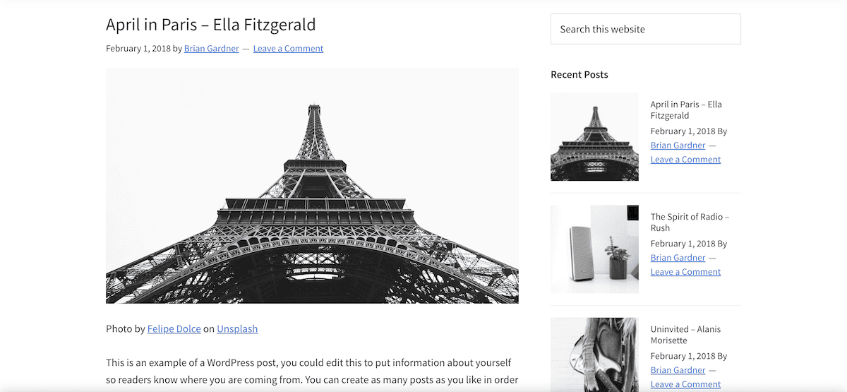 A blog post page using the Genesis Framework. It features a black and white image of the Eiffel Tower in Paris. The post is titled April in Paris – Ella Fitzgerald and dated February 1, 2018. The sidebar shows recent posts with thumbnail images.