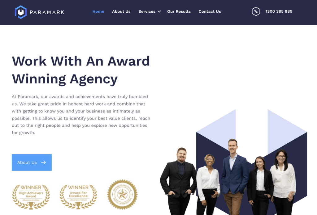 Homepage of Paramark's website featuring a banner with a confident team of five professionals and text promoting their award-winning agency services.