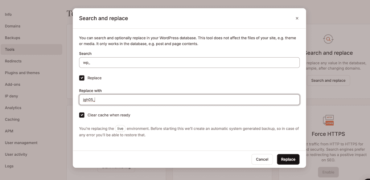 The Search and replace tool within MyKinsta. The dialog window overlays the main interface, with fields to search WordPress databases. The search field contains wp_ and the replace field shows jgh05_. A checkbox for Clear cache when ready is selected, and the dialog includes a warning about automatic backups before making live environment changes.